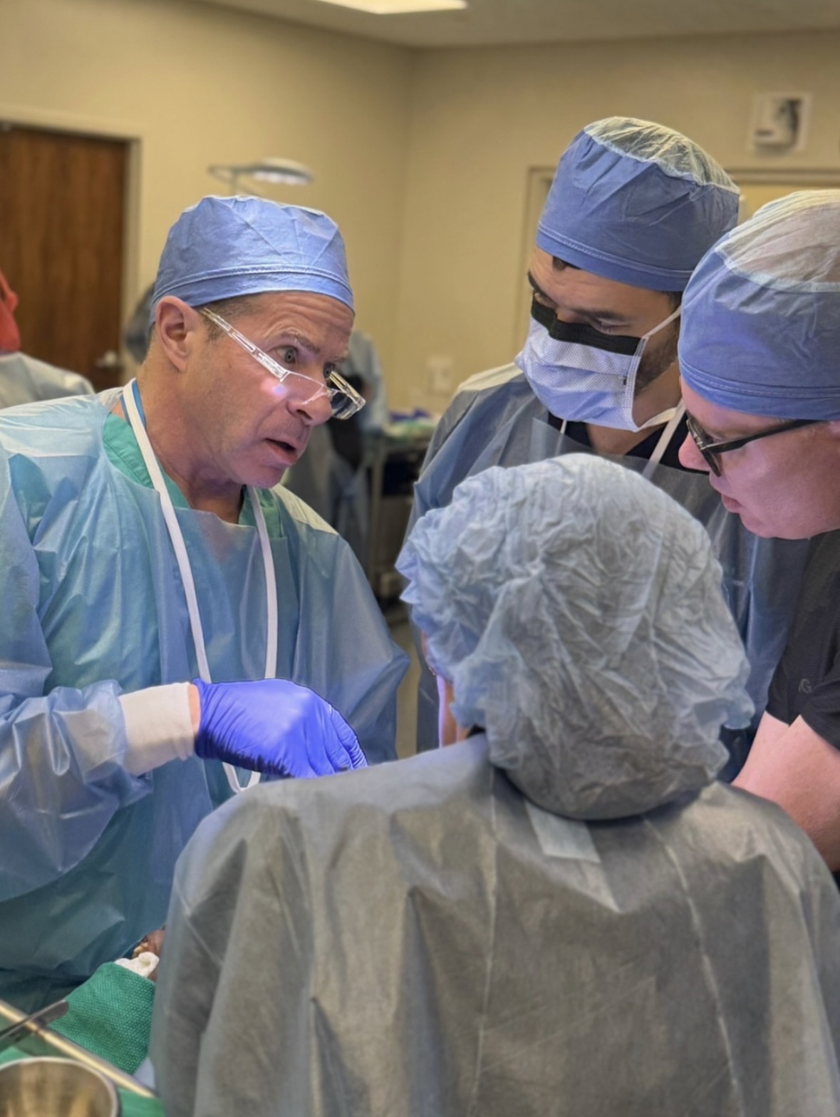 Dr. Albert Carlotti teaching surgeons at a deep-plane facelift course.